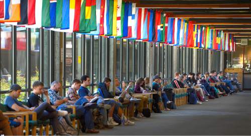 Leah Hogsten  |  The Salt Lake Tribune
Students fill the halls at Utah Valley University's Sorenson Center, October 7, 2015. About 3,450 more students are on campus at Utah's public colleges and universities this semester, and more than half of them are at Utah Valley University. A newly released snapshot of students, both full-time and part-time, shows a statewide 2 percent bump in enrollment. After staying flat for two years, the uptick is driven by a lower minimum age for missionaries announced in 2012 by The Church of Jesus Christ of Latter-day Saints. Men can now leave at 18, instead of 19; women at 19 instead of 21.