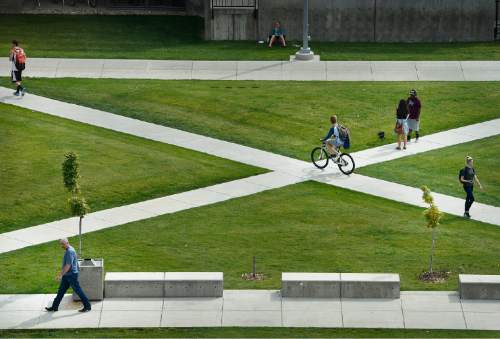 Scott Sommerdorf   |  The Salt Lake Tribune
Students walk to class through the quad near the Liberal Arts Building at UVU, October 6, 2015.