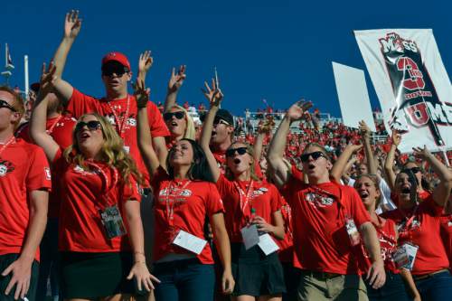 Chris Detrick  |  The Salt Lake Tribune
Members of the MUSS cheer during the first half of the game against Idaho State Bengals at Rice-Eccles stadium Thursday August 28, 2014. Utah is winning the game 35-7.