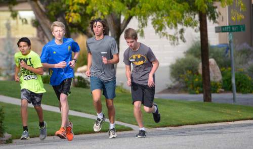 Leah Hogsten  |  The Salt Lake Tribune
Students and staff of Churchill Jr. High celebrated a decades-old tradition Thursday, October 8, 2015 during the annual 5K run/walk that began in 1977 to promote a healthy lifestyle. The race has been dubbed the 'Halloween Hustle,' and students are encouraged to dress in costumes for the event.