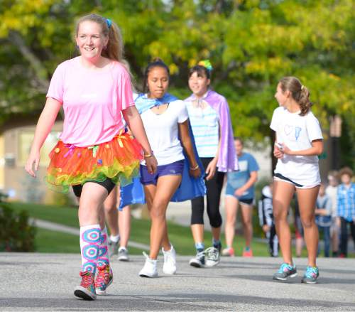 Leah Hogsten  |  The Salt Lake Tribune
Students and staff of Churchill Jr. High celebrated a decades-old tradition Thursday, October 8, 2015 during the annual 5K run/walk that began in 1977 to promote a healthy lifestyle. The race has been dubbed the 'Halloween Hustle,' and students are encouraged to dress in costumes for the event.