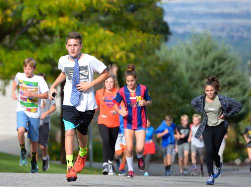 Leah Hogsten  |  The Salt Lake Tribune
Students and staff of Churchill Jr. High celebrated a decades-old tradition Thursday, October 8, 2015 during the annual 5K run/walk that began in 1977 to promote a healthy lifestyle. The race has been dubbed the ëHalloween Hustle,í and students are encouraged to dress in costumes for the event.
