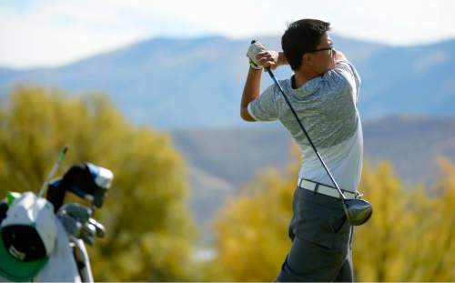 Leah Hogsten  |  The Salt Lake Tribune
Garret Furubayashi of Rowland Hall fires off the tee Thursday, October 8, 2015 on his way to winning the 2A Boys State Championship after winning a two-hole playoff with Manti's Davis Hardy.