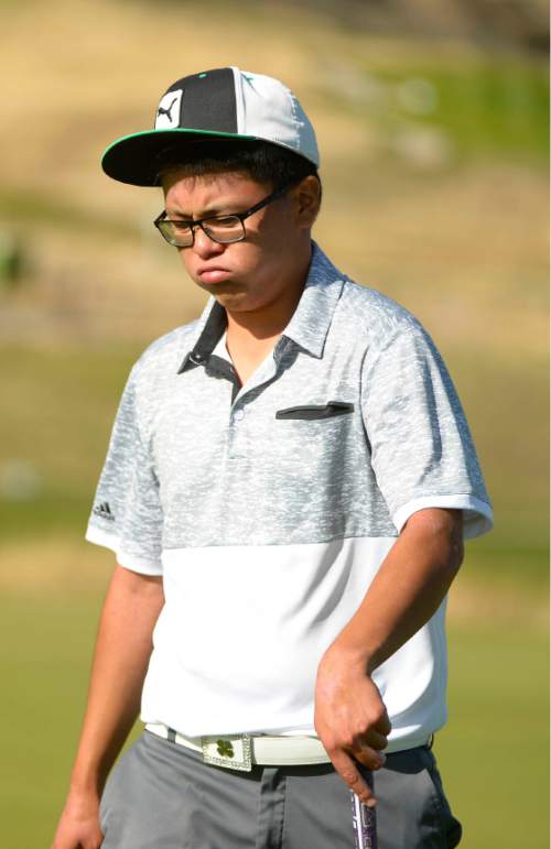 Leah Hogsten  |  The Salt Lake Tribune
Garret Furubayashi of Rowland Hall reacts to his play Thursday, October 8, 2015 on his way to winning the 2A Boys State Championship after winning a two-hole playoff with Manti's Davis Hardy.