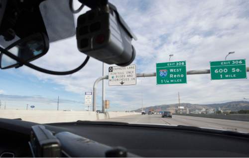 Steve Griffin  |  The Salt Lake Tribune

Utah Highway Patrol Trooper Rod Elmer patrols along I-15 in the Salt Lake City, Thursday, October 8, 2015, during a blitz to enforce laws about who is allowed in the freeway express lanes.