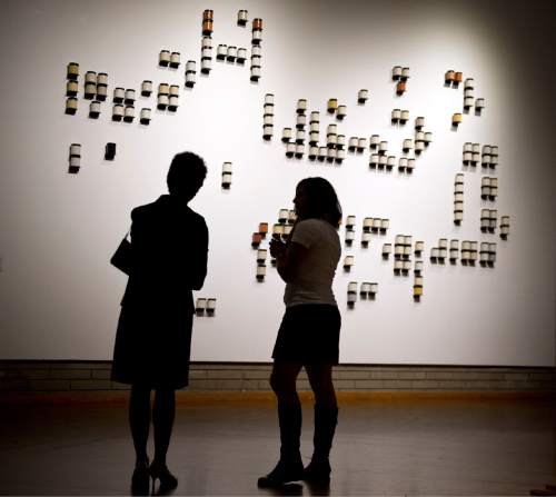 Lennie Mahler  |  The Salt Lake Tribune
National Endowment for the Arts Chairman Jane Chu tours the "Grandma's Cupboard" exhibit by Kate Ericson and Mel Ziegler with curator Rebecca Maksym at the Utah Museum of Contemporary Art on Oct. 9, 2015.