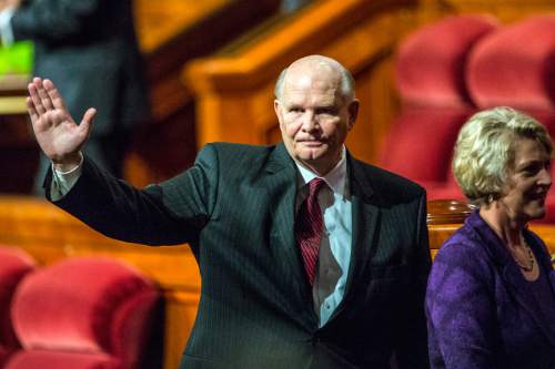 Chris Detrick  |  The Salt Lake Tribune
New apostle Dale G. Renlund waves to the crowd after the  afternoon session of the 185th LDS General Conference at  the Conference Center in Salt Lake City Saturday October 3, 2015.