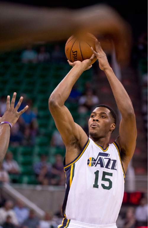 Lennie Mahler  |  The Salt Lake Tribune
Derrick Favors drains a long jumper in the first half as the Utah Jazz face the Charlotte Hornets at EnergySolutions Arena on Monday, March 16, 2015.