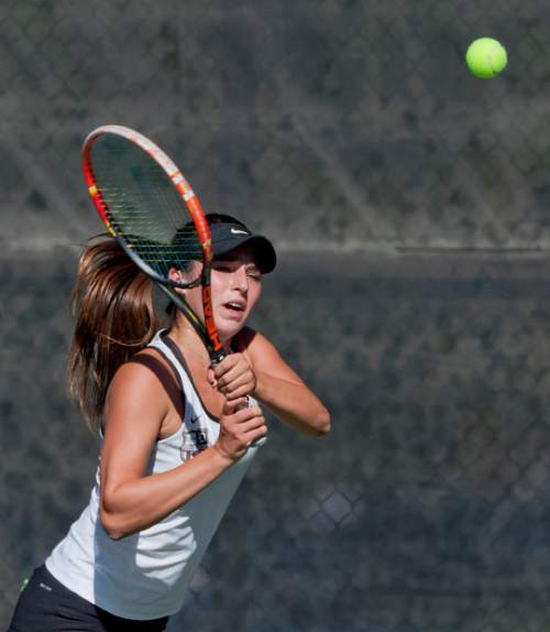 Michael Mangum  |  Special to the Tribune

Davis High School's Whitney Turley hits a backhand return during the 5A first singles tennis state championship finals against Leah Heimuli of Lone Peak Highat Liberty Park in Salt Lake City, UT on Saturday, October 10, 2015. Turley defeated Heimuli to win the 5A championship.