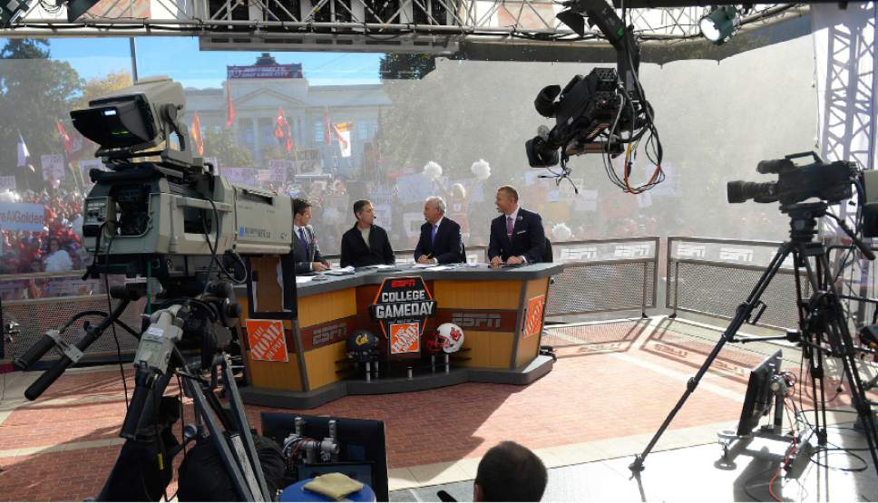Leah Hogsten  |  The Salt Lake Tribune
l-r ESPN's "College GameDay," cast Rece Davis, local celebrity John Stockton, Lee Corso and Kirk Herbstreit share a laugh. Hundreds of fans cheered for their teams Saturday, October 10, 2015, at The University of Utah's President's Circle, during the filming of ESPN's "College GameDay," a sports television show that previews and predicts winners of the nation's college football games and picked No. 5 Utah to beat No. 23 Cal.