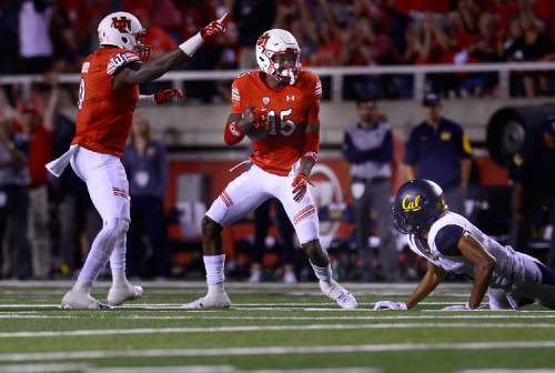 Scott Sommerdorf   |  The Salt Lake Tribune
Utah DB Dominique Hatfield grabs an interception away from Cal WR Kenny Lawler during first half play. Utah held a 24-17 lead at the half, Saturday, October 10, 2015.
