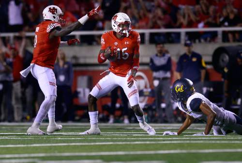 Utah's Dominique Hatfield grabs an interception away from California's Kenny Lawler in the first half during an NCAA college football game Saturday, Oct. 10, 2015, in Salt Lake City. (Scott Sommerdorf/The Salt Lake Tribune via AP) DESERET NEWS OUT; LOCAL TELEVISION OUT; MAGS OUT; MANDATORY CREDIT