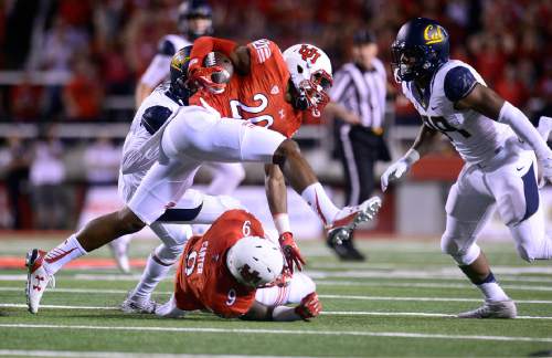 Utah's Marcus Williams runs with an interception during the first half of an NCAA college football game against California, Saturday, Oct. 10, 2015, in Salt Lake City. (Scott Sommerdorf/The Salt Lake Tribune via AP) DESERET NEWS OUT; LOCAL TELEVISION OUT; MAGS OUT; MANDATORY CREDIT