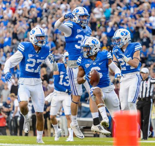 Trent Nelson  |  The Salt Lake Tribune
Brigham Young Cougars wide receiver Trey Dye (6) celebrates a touchdown as BYU hosts East Carolina, college football at LaVell Edwards Stadium in Provo, Saturday October 10, 2015.