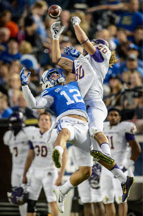 Trent Nelson  |  The Salt Lake Tribune
Brigham Young Cougars defensive back Kai Nacua (12) tries to defend a pass to East Carolina Pirates tight end Bryce Williams (80) as BYU hosts East Carolina, college football at LaVell Edwards Stadium in Provo, Saturday October 10, 2015.