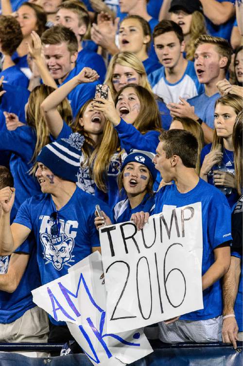 Trent Nelson  |  The Salt Lake Tribune
BYU fans cheer and take a selfie as BYU hosts East Carolina, college football at LaVell Edwards Stadium in Provo, Saturday October 10, 2015.