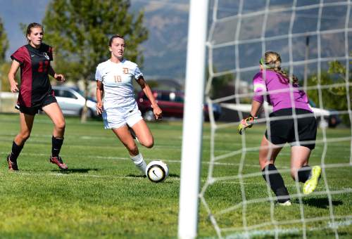 Scott Sommerdorf   |  The Salt Lake Tribune
Davis' Olivia Wade somehow manages not to score on this chance in front of Viewmont's goal during first half play. Davis defeated Viewmont 5-2, Thursday, September 10, 2015.