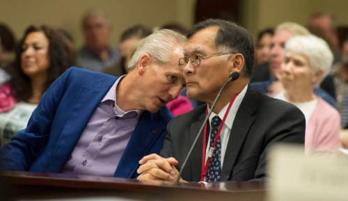 Steve Griffin  |  The Salt Lake Tribune

Senate President Wayne Niederhauser, left, asks Sen. Brian E. Shiozawa, R-Salt Lake City, a question as they address the Health Reform Task Force during a meeting to discuss where Utah is at on covering low-income residents falling in the current insurance gap. The meeting was held at the House Building on capitol hill 
in Salt Lake City, Tuesday, October 6, 2015.
