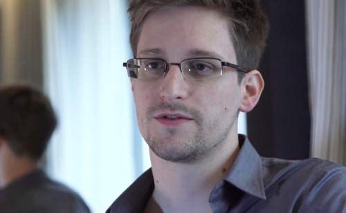 FILE - In this June 9, 2013 file photo provided by The Guardian Newspaper in London shows Edward Snowden, who worked as a contract employee at the National Security Agency, in Hong Kong.  (AP Photo/The Guardian, Glenn Greenwald and Laura Poitras, File)