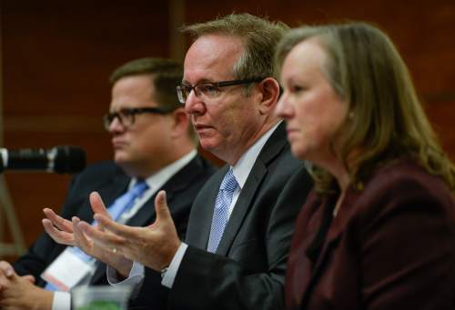 Francisco Kjolseth | The Salt Lake Tribune
David Winberg, center, Director of the NSA Operations Center in Utah attends a conference at the University of Utah hosted by Congressman Chris Stewart entitled America's Role in the World on Tuesday, Oct. 13, 2015. Also pictured are Scott Simpson of the Utah Credit Union Association and Major General Jennifer Napper (US Army retired), Unsys.