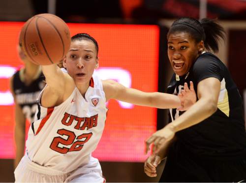 Steve Griffin  |  The Salt Lake Tribune

Utah Utes guard Danielle Rodriguez (22) holds off Colorado Buffaloes guard Ashley Wilson (12) as she stretches for the ball during second half action in the Utah versus Colorado women's basketball game at the Huntsman Center in Salt Lake City, Utah Wednesday, January 29, 2014.