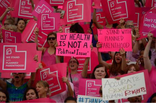 Leah Hogsten  |  The Salt Lake Tribune
The Utah Capitol was covered in pink Aug. 25, 2015, as Planned Parenthood Action Council of Utah held a community rally that drew proponents of the family- planning organization.