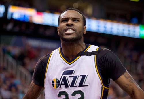 Lennie Mahler  |  The Salt Lake Tribune

Trevor Booker celebrates after he scores and draws a foul in the first half of a game between the Utah Jazz and Oklahoma City Thunder at EnergySolutions Arena on Saturday, March 28, 2015.