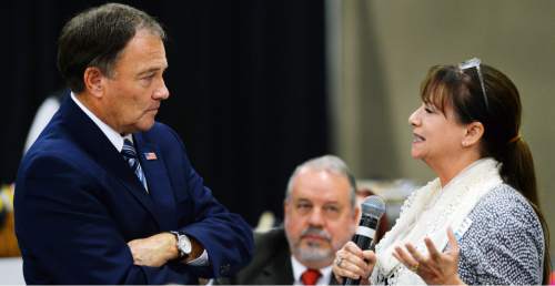 Steve Griffin  |  The Salt Lake Tribune

South Ogden Junior High School english teacher Kim Irvine asks Gov. Gary Herbert a question as they attend the Hot Topics and Hot Dogs discussion at the Annual Utah Education Association Convention & Education Exposition at the South Towne Expo Center in Sandy, Thursday, October 15, 2015.