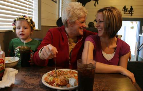 Photo by Leah Hogsten  |  The Salt Lake Tribune
Above, l-r granddaughter Sage Criddle, 3, Emmy Criddle and daughter Kelli Call share a laugh during lunch. 
Upcoming construction on Layton's Main Street for the new Interstate-15 interchange, is forcing long-time diner Doug & Emmy's Family Restaurant to close after 20-years of serving up daily plate specials to the locals. The diner will be relocating to Mayfield in Sanpete County. 
12/23/09 Layton