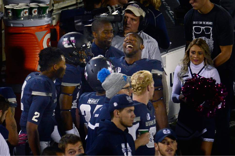 Scott Sommerdorf   |  The Salt Lake Tribune
Utah State players celebrate a TD pass to give USU a 38-10 lead during first half play. Utah State led Boise State 45-10 at the half, Friday, October 15, 2015.