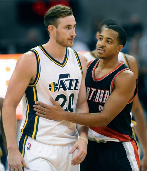 Steve Griffin  |  The Salt Lake Tribune

Portland Trail Blazers guard C.J. McCollum (3) embraces Utah Jazz guard Gordon Hayward (20) after McCollum was given a flagrant foul and ejected from the game for a hard foul on Hayward late in the second half of the Utah Jazz versus the Portland Trailblazers preseason NBA basketball game at EnergySolutions Arena in Salt Lake City, Monday, October 12, 2015.
