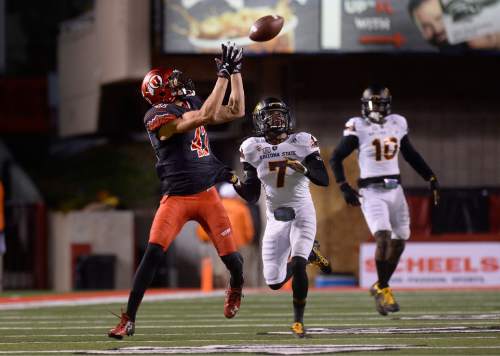 Scott Sommerdorf   |  The Salt Lake Tribune
Utah Utes TE Caleb Repp (47) could not hold on to this first half pass from Travis Wilson. Utah led Arizona State 14-10 at the half, Saturday, October 17, 2015.