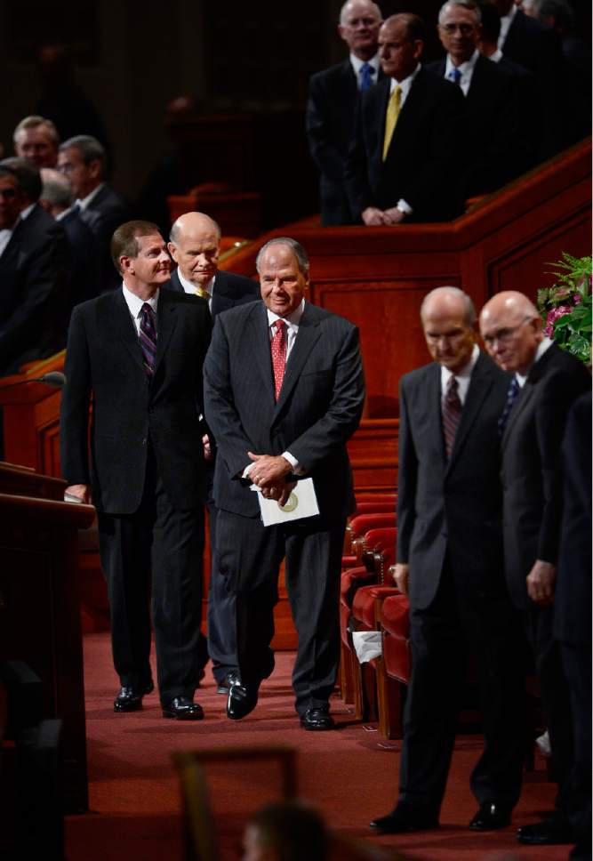 Scott Sommerdorf   |  The Salt Lake Tribune
The newest members of the Quorum of the Twelve Apostles, Gary E. Stevenson, left, Dale G. Renlund, second from left,  and Ronald A. Rasband, third from left, stand as they wait their turn to leave at the end of the morning session of the 185th Semiannual General Conference, Sunday, October 4, 2015.at the 185th Semiannual General Conference, Sunday, October 4, 2015.