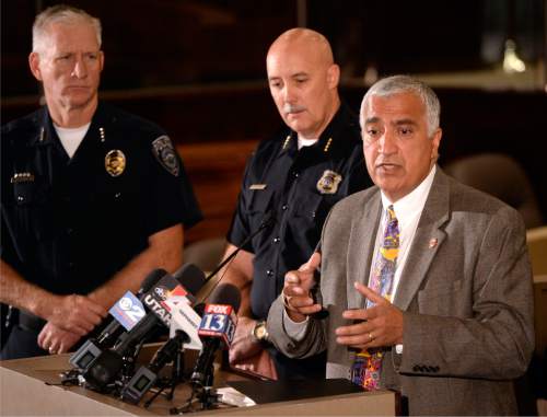 Al Hartmann  |  The Salt Lake Tribune
Salt Lake County District Attorney Sim Gill holds a press conference Monday October 19 with Salt Lake City Police Chief Mike Brown, middle, to discuss the findings of the Officer Involved Critical Incident (OICI) review and Salt Lake County Sheriff Jim Winder, left, in the Sept. 23 incident involving  Salt Lake City Police Department Officer Ben Hone who shot and killed a home intruder as he assaulted Salt Lake City residents and sisters Breann and Kayli Lasley.   The review determined the use of deadly force by Hone was legally justified.