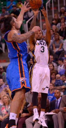 Leah Hogsten  |  The Salt Lake Tribune
Utah Jazz guard Trey Burke (3) had 20 points during the game. Oklahoma City Thunder defeated the Utah Jazz  113-102, Tuesday, October 20, 2015 at Energy Solutions Arena.