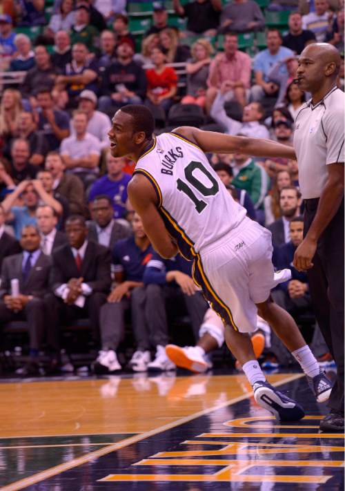 Leah Hogsten  |  The Salt Lake Tribune
Utah Jazz guard Alec Burks (10) reacts as he looks back to see his lay-up shot miss the net. Oklahoma City Thunder defeated the Utah Jazz  113-102, Tuesday, October 20, 2015 at Energy Solutions Arena.
