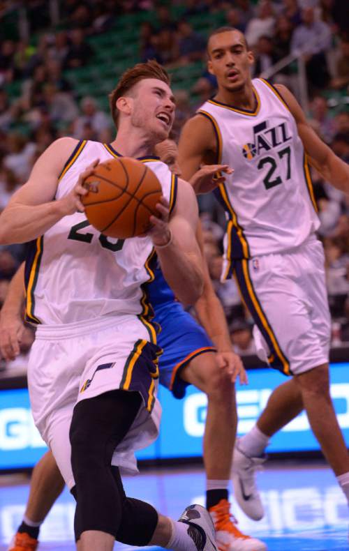 Leah Hogsten  |  The Salt Lake Tribune
Utah Jazz guard Gordon Hayward (20) grimaces as he pulls down a pass. Hayward had 18 points in the game. Oklahoma City Thunder defeated the Utah Jazz  113-102, Tuesday, October 20, 2015 at Energy Solutions Arena.