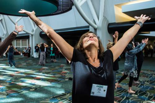 Chris Detrick  |  The Salt Lake Tribune
Sally Annabella, of Seattle, dances with Uniting Flash Mob during the Parliament of the World's Religion at the Salt Palace Convention Center Saturday October 17, 2015.