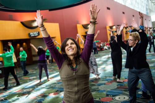 Chris Detrick  |  The Salt Lake Tribune
Hilary Lake, of Plainfield, Mass., dances with Uniting Flash Mob during the Parliament of the World's Religion at the Salt Palace Convention Center Saturday October 17, 2015.