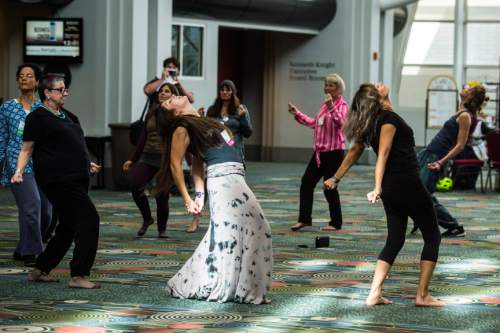 Chris Detrick  |  The Salt Lake Tribune
Dancers with Uniting Flash Mob dance during the Parliament of the World's Religion at the Salt Palace Convention Center Saturday October 17, 2015.