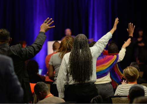 Francisco Kjolseth | The Salt Lake Tribune
People rise up as Bishop Yvette Flunder delivers an impassioned keynote address to two hundred lesbian, gay, bisexual, transgender and queer (LGBTQ) advocates and faith leaders participating in the Faith & Family LGBTQ Power Summit in Salt Lake City this week. Hosted by the National LGBTQ Task Force, the four-day gathering focuses on elevating the voices of LGBTQ faith leaders, addressing attacks by anti-LGBTQ politicians using religion to discriminate against them, and providing communities of faith with tools to create a welcoming environment for LGBTQ people.