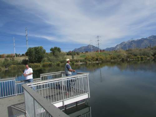 Tom Wharton  |  The Salt Lake Tribune

Monte Rouska and Roger Olsen enjoy an afternoon fishing trip at Sandy Pond.