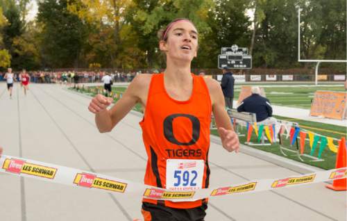 Rick Egan  |  The Salt Lake Tribune

Alek Parsons crosses the finish line in first for the Ogden Tigers, in the Boys 4A cross country state championship race at Sugarhouse Park, Wednesday, October 21, 2015.