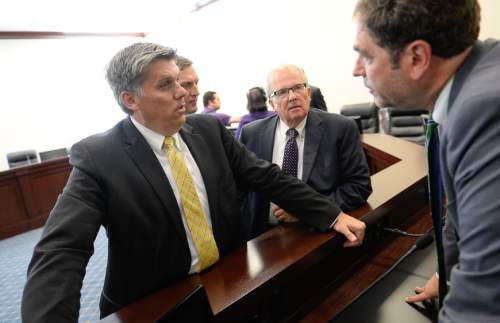 Francisco Kjolseth | The Salt Lake Tribune
San Juan County Commissioner Phil Lyman, left, joined by Rep. Mike Noel, R-Kanab, center, speaks with House Minority Leader Brian King, following a meeting by members of Utah's Constitutional Defense Council at the Capitol on Wednesday, June 24, 2015. Rep. Mike Noel tried to make a case for setting aside money for Phil Lyman's legal bills. In the end it was decided that money will be raised by private donations.