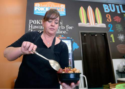 Al Hartmann  |  The Salt Lake Tribune
Poke bowls are made up on the spot by owner Deanna Zouras at the Laid Back Poke Shack at 6213 E. Highland Drive in Holladay.