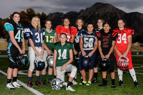 Trent Nelson  |  The Salt Lake Tribune
There are currently 14 girls playing high school football across the state, including, left to right, Morgan Cheney (Canyon View), Abby Pruitt (Layton), Taylor Stevens (Clearfield), Ashley Denning (Olympus), Morgan Lukrich (Park City), Jacquelyn Hanks (Alta), Bailie Appleton (Corner Canyon), Jacinda Riehm (Jordan), Izzy Martinez (West), and Emmalee Mayes (Uintah). Wednesday October 21, 2015.