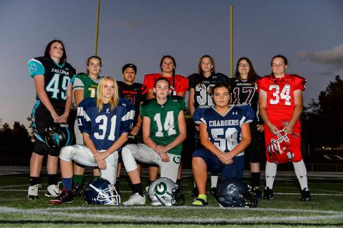 Trent Nelson  |  The Salt Lake Tribune
There are currently 14 girls playing high school football across the state, including, left to right, Morgan Cheney (Canyon View), Taylor Stevens (Clearfield), Abby Pruitt (Layton), Izzy Martinez (West), Ashley Denning (Olympus), Morgan Lukrich (Park City), Jacquelyn Hanks (Alta), Bailie Appleton (Corner Canyon), Jacinda Riehm (Jordan), and Emmalee Mayes (Uintah). Wednesday October 21, 2015.