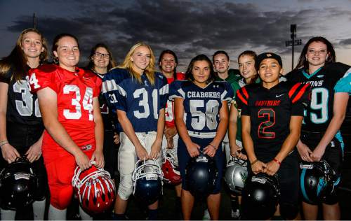 Trent Nelson  |  The Salt Lake Tribune
There are currently 14 girls playing high school football across the state, including, left to right, Jacquelyn Hanks (Alta), Emmalee Mayes (Uintah), Jacinda Riehm (Jordan), Abby Pruitt (Layton), Morgan Lukrich (Park City), Bailie Appleton (Corner Canyon), Ashley Denning (Olympus), Taylor Stevens (Clearfield), Izzy Martinez (West), and Morgan Cheney (Canyon View). Wednesday October 21, 2015.