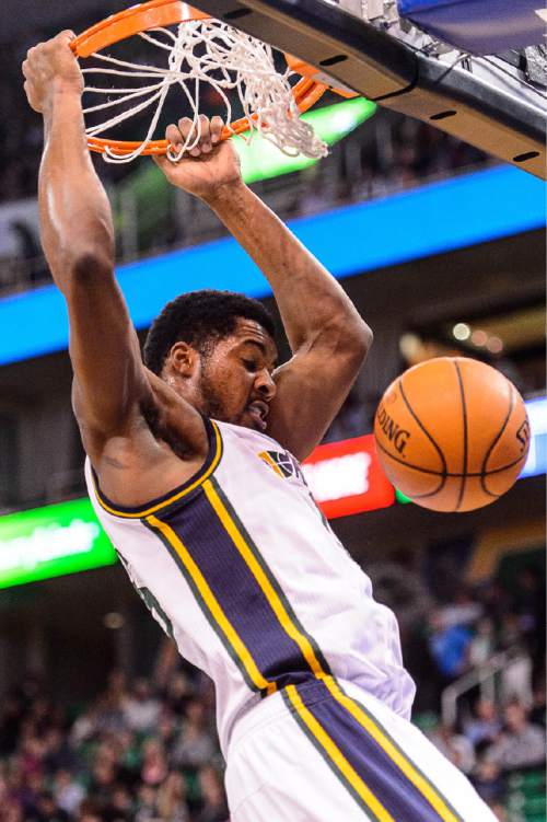 Trent Nelson  |  The Salt Lake Tribune
Utah Jazz forward Derrick Favors (15) dunks the ball as the Utah Jazz host the Sacramento Kings at EnergySolutions Arena in Salt Lake City, Wednesday April 8, 2015.