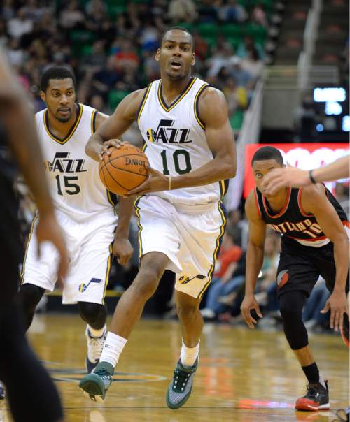 Steve Griffin  |  The Salt Lake Tribune

Utah Jazz guard Alec Burks (10) breaks free to the basket during the Utah Jazz versus the Portland Trailblazers preseason NBA basketball game at EnergySolutions Arena in Salt Lake City, Monday, October 12, 2015.